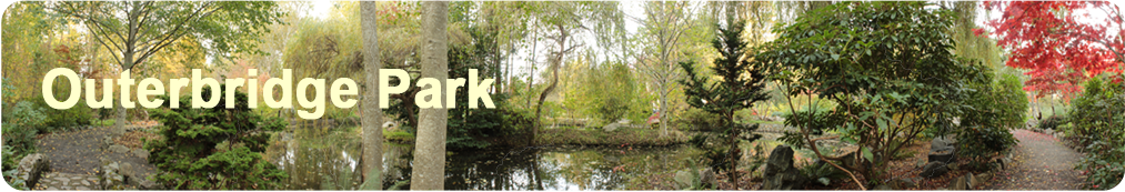 a panoramic view of the pathway and the main pond in Outerbridge Park